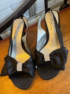 The Touch of Nina, Black Satin with bows.  2 inch heel,  Size 6.5 Medium. 👀